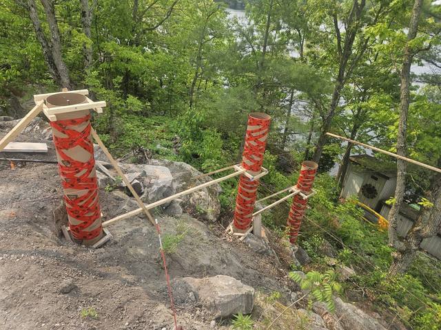 Pier forms anchored down the rock slope