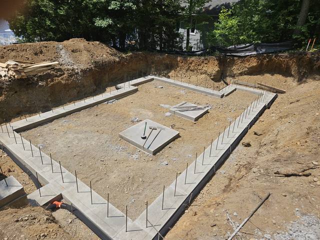 Poured footings around the fireplace pad