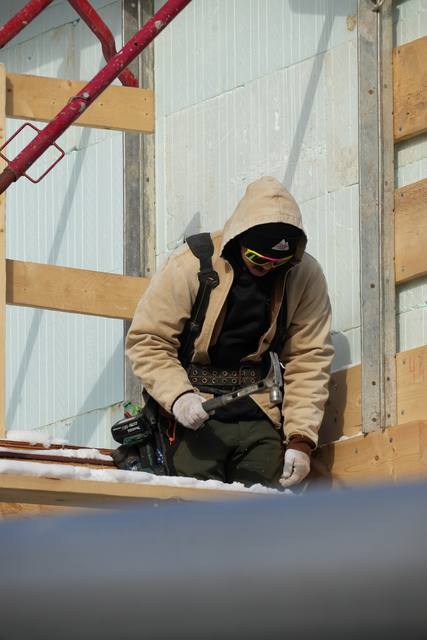 Detailing an ICF wall in February; the work does not stop for the weather