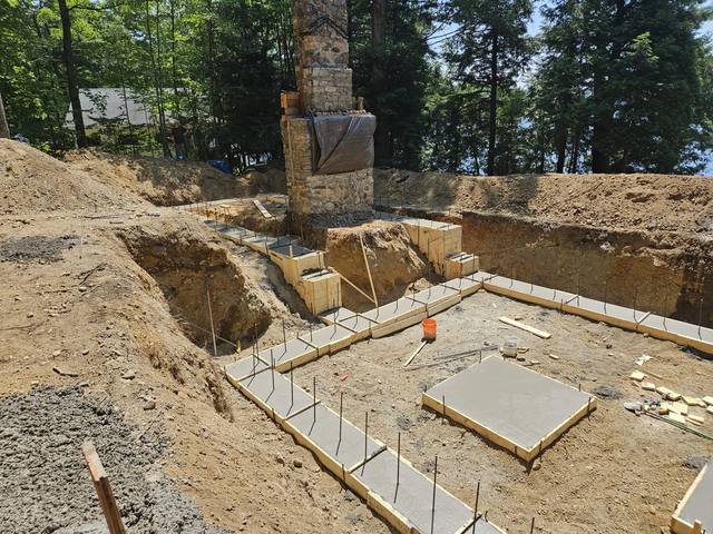 Footing forms and pads beside the preserved chimney