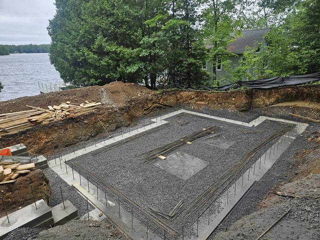 Formwork stepping down a rock face, braced and ready for concrete