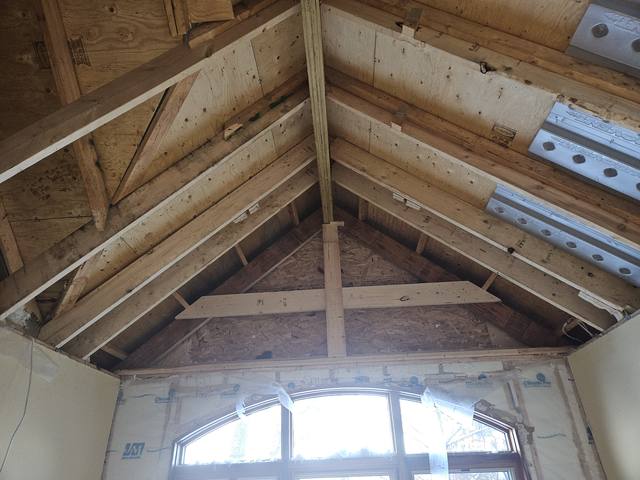 A renovation — cathedral ceiling framing opened up inside
